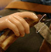Detail of the powder horn of the frontiersman.
